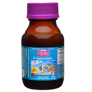 Bottle of '8 Immortals' dragon drops with a purple cap on a gray background