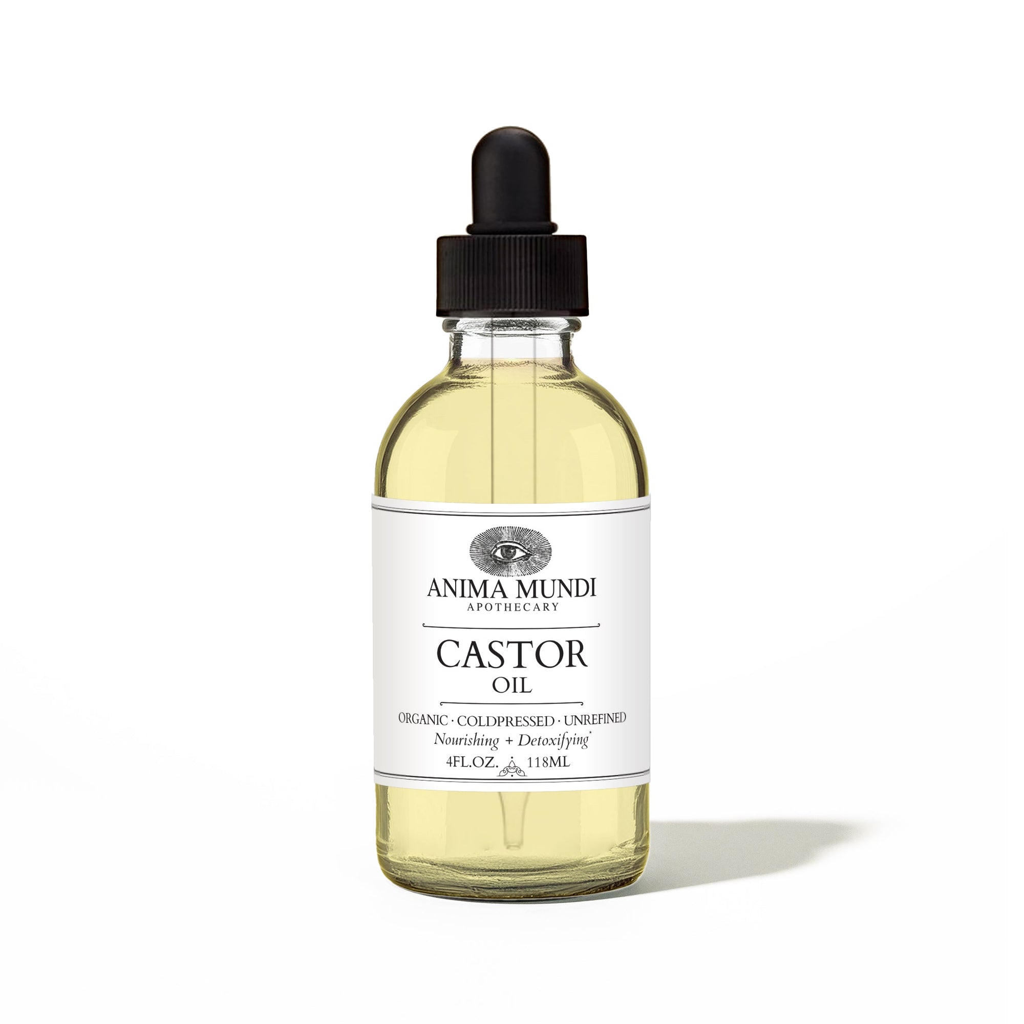 Bottle of Anima Mundi Castor Oil with dropper on a white background