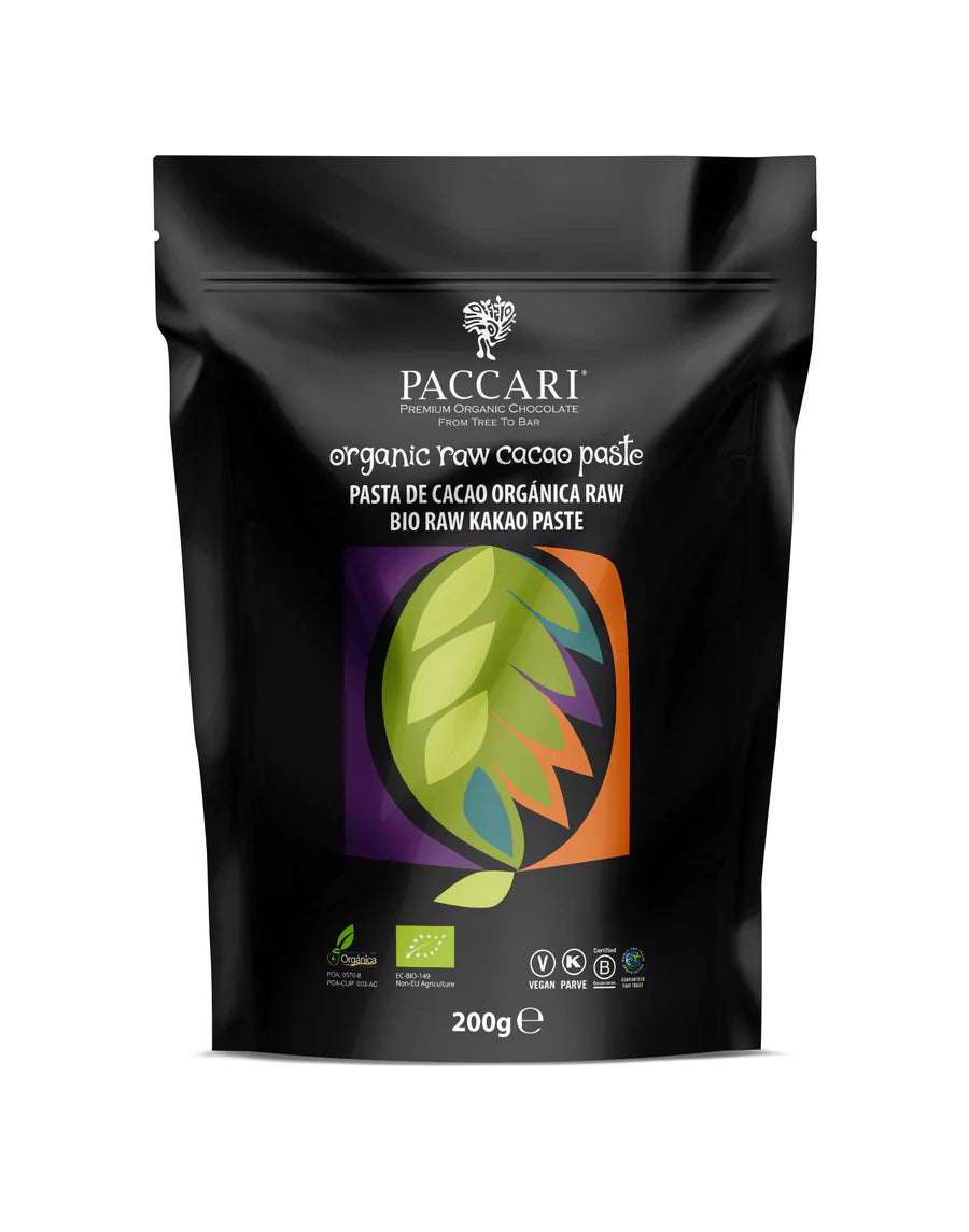 A package of Paccari Raw Organic Ceremonial Grade Cacao Paste, with a graphic of a cacao pod and leaves on the front.