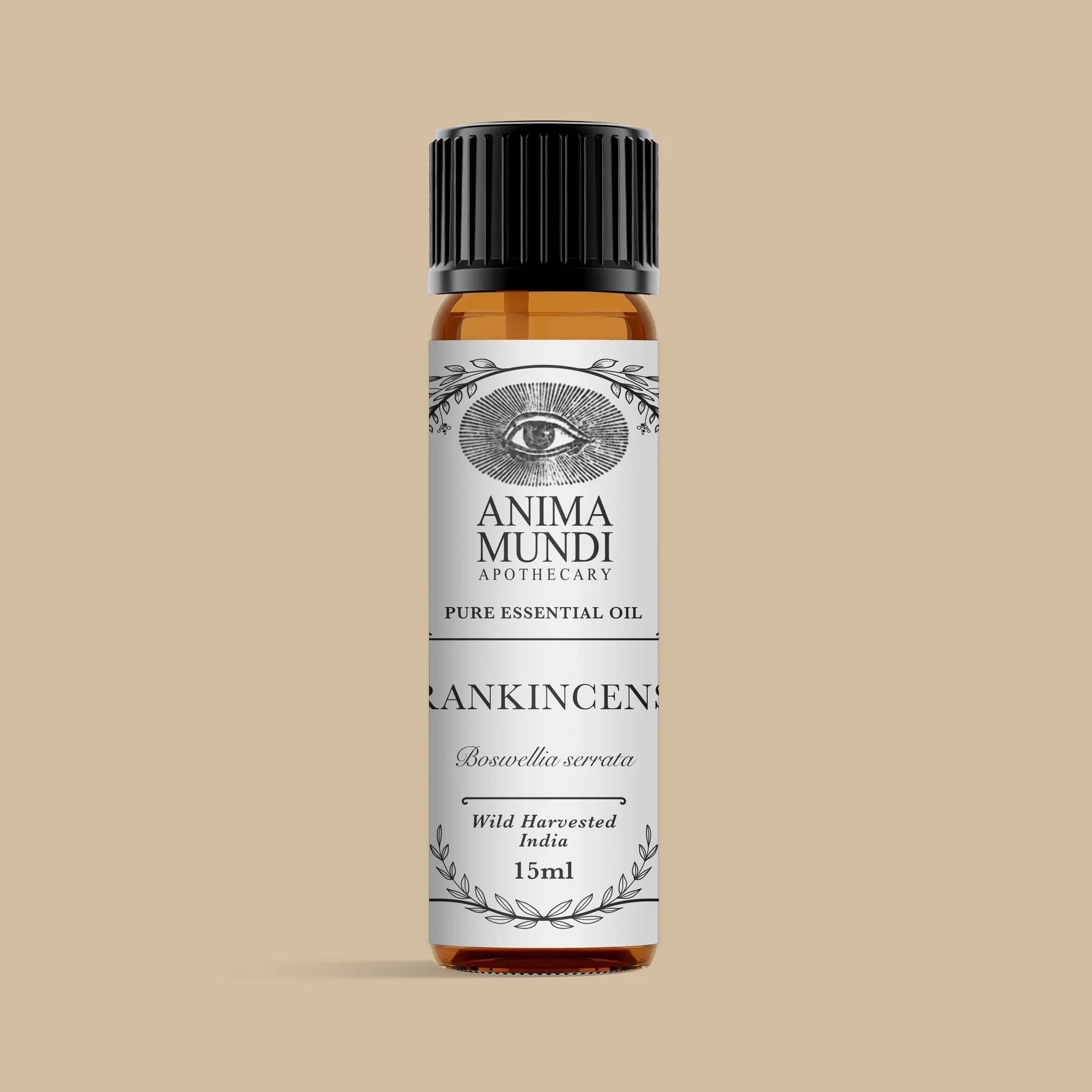 Anima Mundi essential oil bottle on a beige background