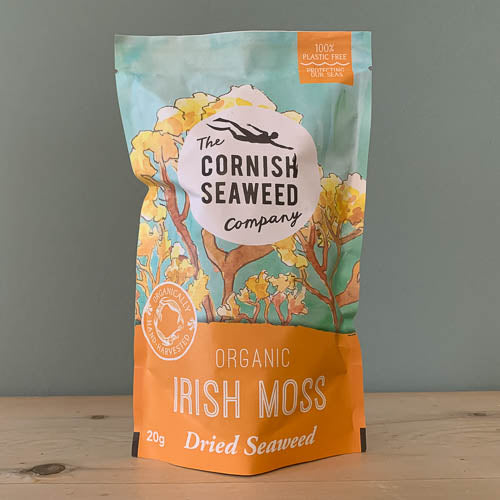 Packaging of Organic Irish Moss by The Cornish Seaweed Company, showing a dried seaweed product in a 20g bag with decorative elements and branding.