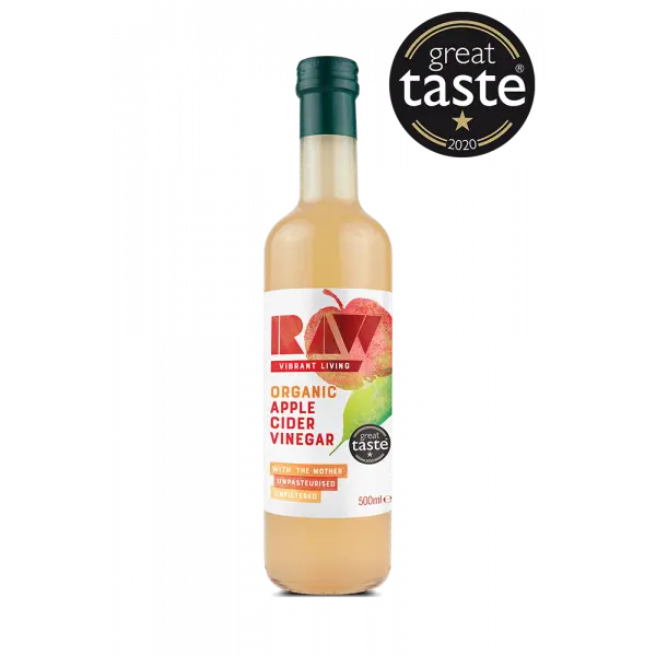Bottle of organic apple cider vinegar with a 'Great Taste' award on a white background