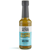 A bottle of Eaten Alive Jalapeño & Lime Fermented Hot Sauce with a label showing the brand name, product name, and the phrase 'Raw Vegan Bio Live'.