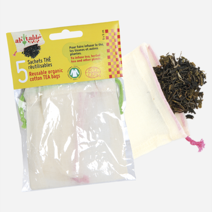 Pack of reusable organic cotton tea bags with a sample bag on a white background