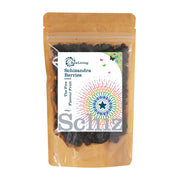 Packaged dried Schizandra berries in a clear plastic pouch with a label showing product name and an graphic logo