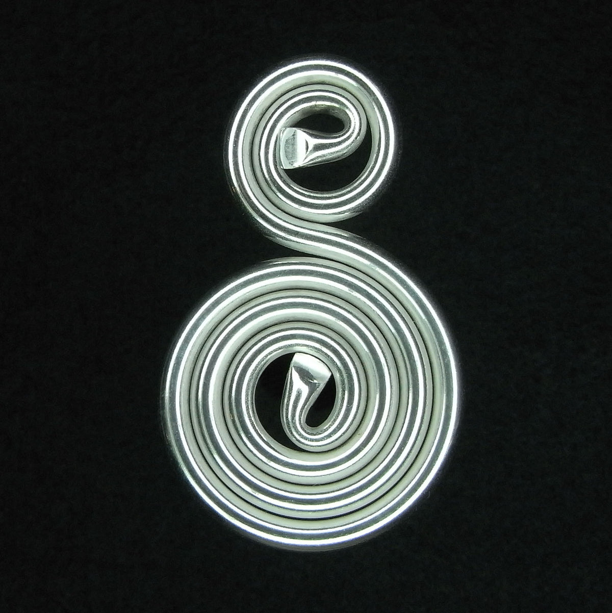 Rhodium Harmoniser | CIR | Raw Living UK | EMF Protection | Centre for Implosion Research (CIR) Phi ‘F’ Personal Harmoniser (Rodium) is a flat spiral form made from copper tubing, filled with CIR imploded water.